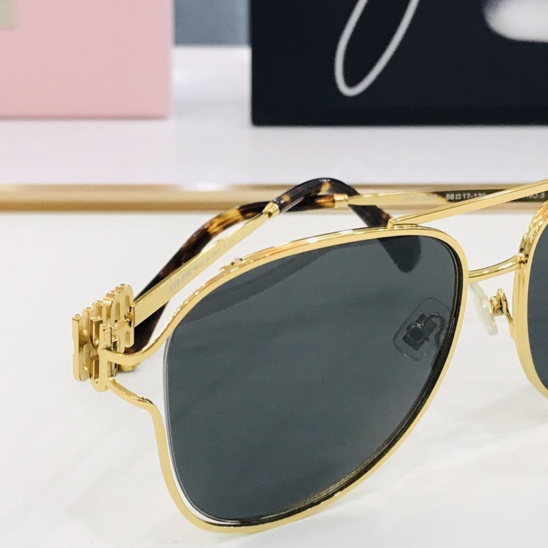 Miu miu Sunglasses